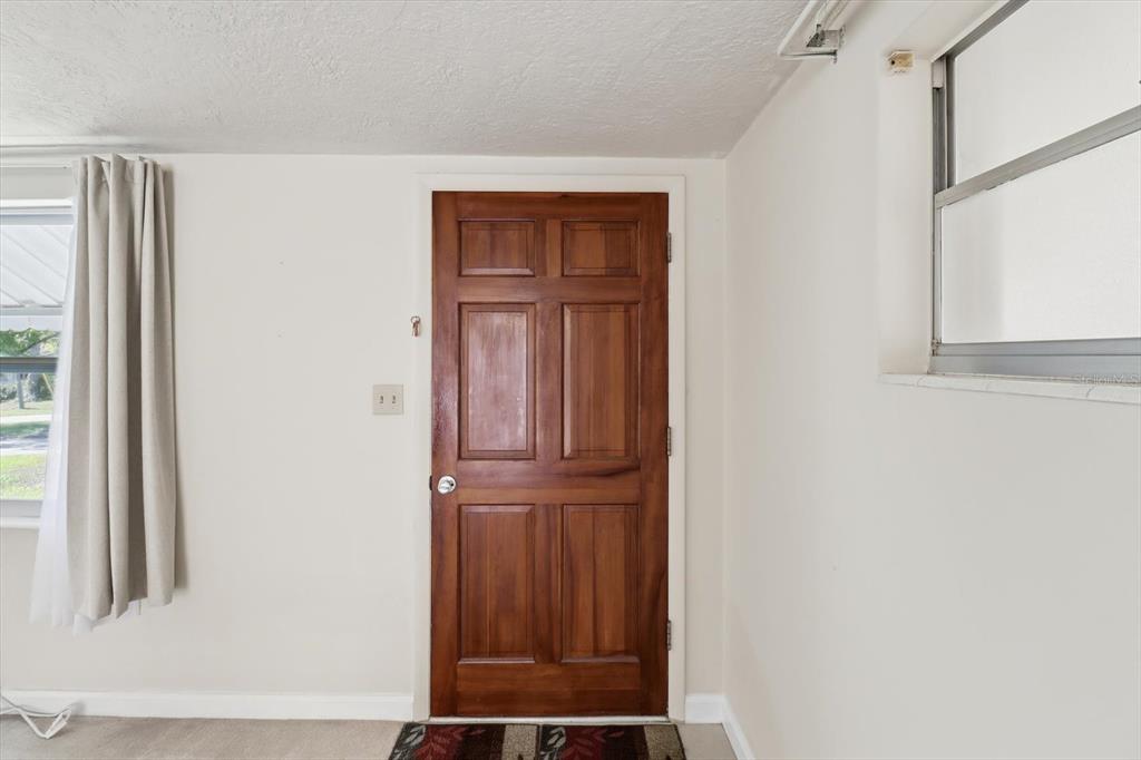 11 Roosevelt Boulevard Beverly Hills, FL 34465 - Photo 4 of 35 a view of front door