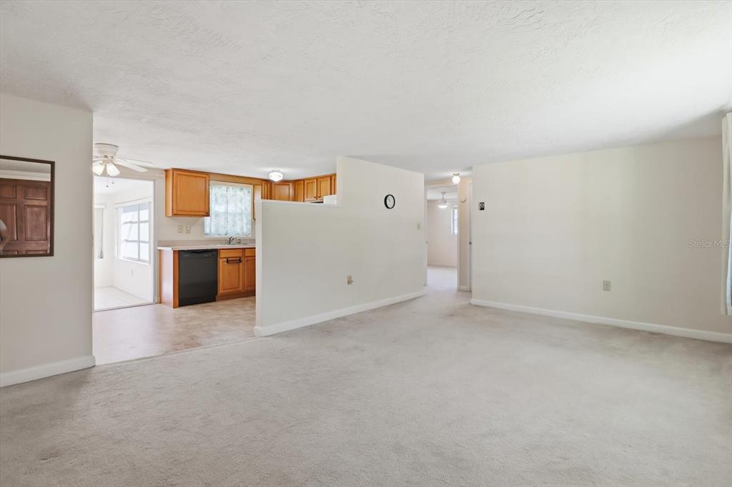 11 Roosevelt Boulevard Beverly Hills, FL 34465 - Photo 5 of 35 an empty room with a kitchen and a sink