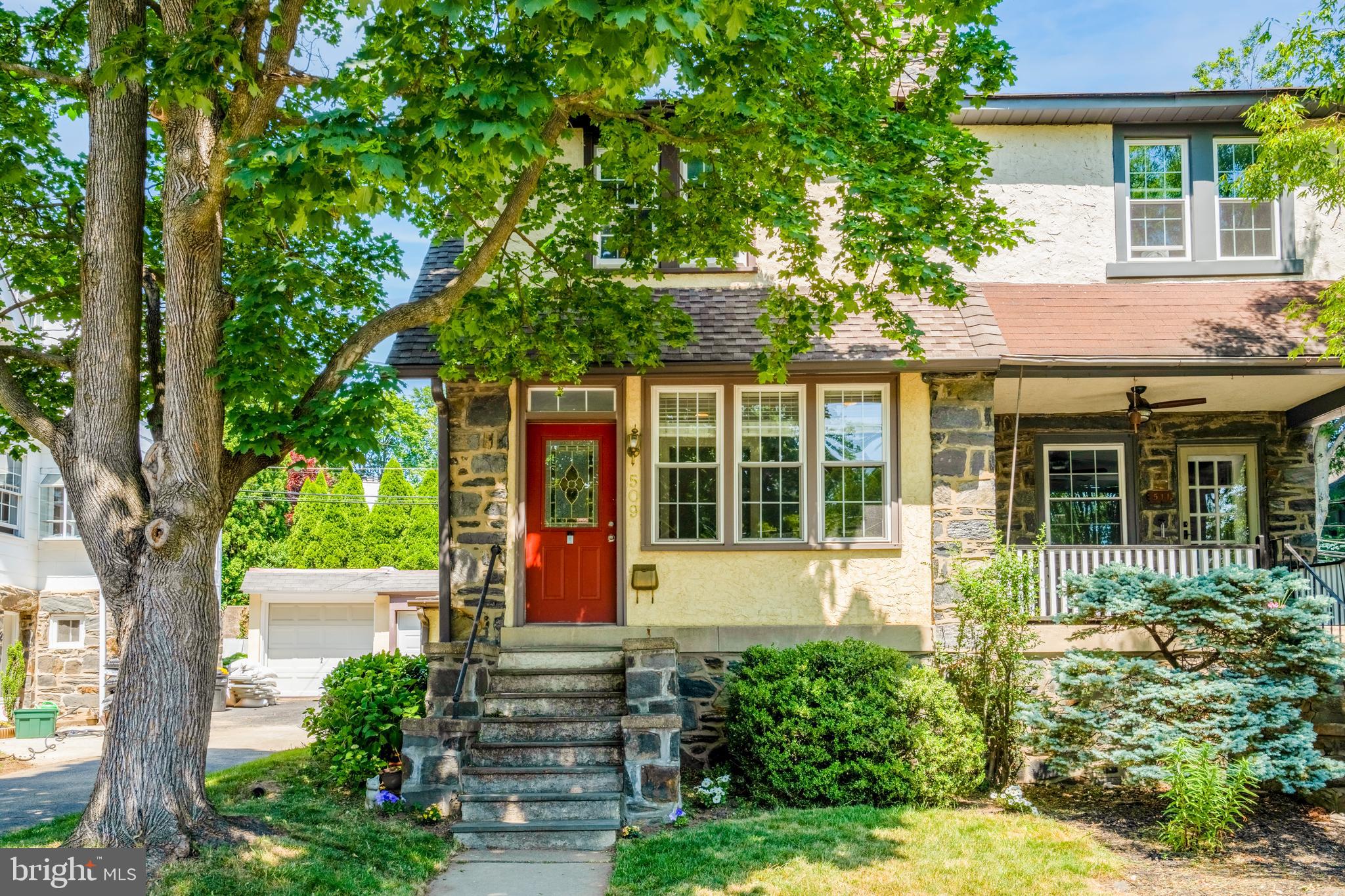 front view of a house with a yard