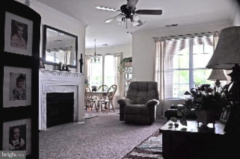 20415 Riverbend Square, Unit 101 Sterling, VA 20165 - Photo 2 of 23 Living room from foyer