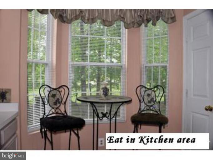 20415 Riverbend Square, Unit 101 Sterling, VA 20165 - Photo 13 of 23 Bay window with table area