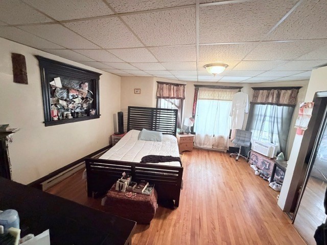 47 Acton Street Worcester, MA 01604 - Photo 21 of 30 a living room with a couch wooden floor and a table