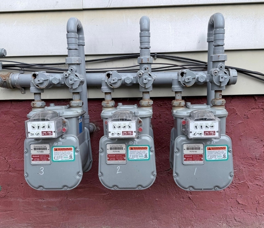 47 Acton Street Worcester, MA 01604 - Photo 29 of 30 a close view of water heater