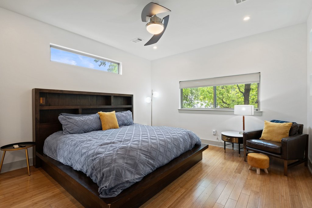 1131 Poquito Street, Unit A Austin, TX 78702 - Photo 20 of 34 a bedroom with a bed and window