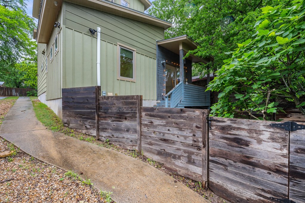 1131 Poquito Street, Unit A Austin, TX 78702 - Photo 32 of 34 a view of a house with a yard