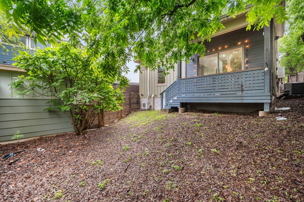1131 Poquito Street, Unit A Austin, TX 78702 - Photo 33 of 34 a view of a house with a yard