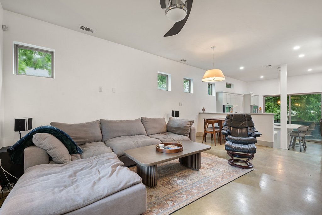 1131 Poquito Street, Unit A Austin, TX 78702 - Photo 6 of 34 a living room with furniture and wooden floor