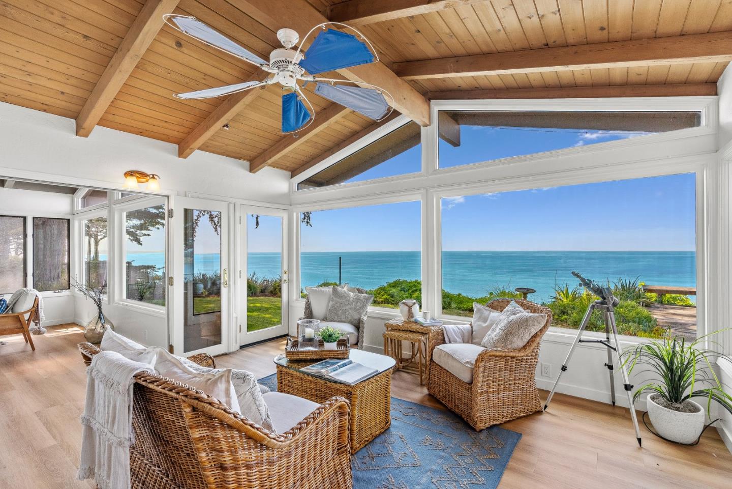 701 Seacliff Drive Aptos, CA 95003 - Photo 12 of 76 a living room with patio furniture and a potted plant
