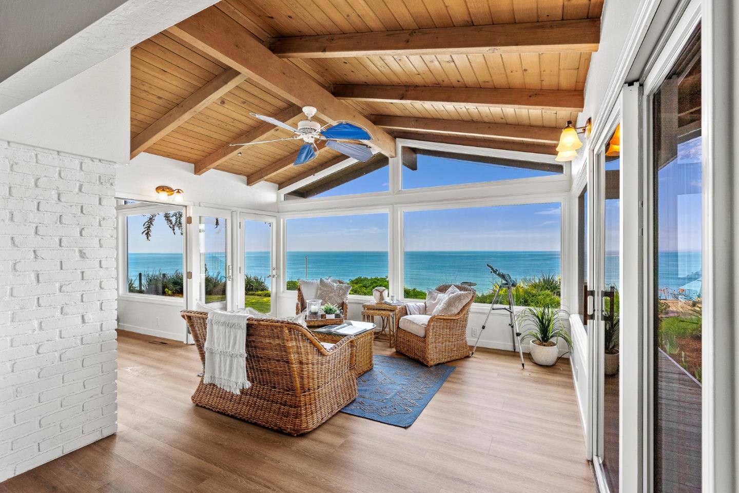 701 Seacliff Drive Aptos, CA 95003 - Photo 13 of 76 a living room with furniture floor to ceiling window and wooden floor