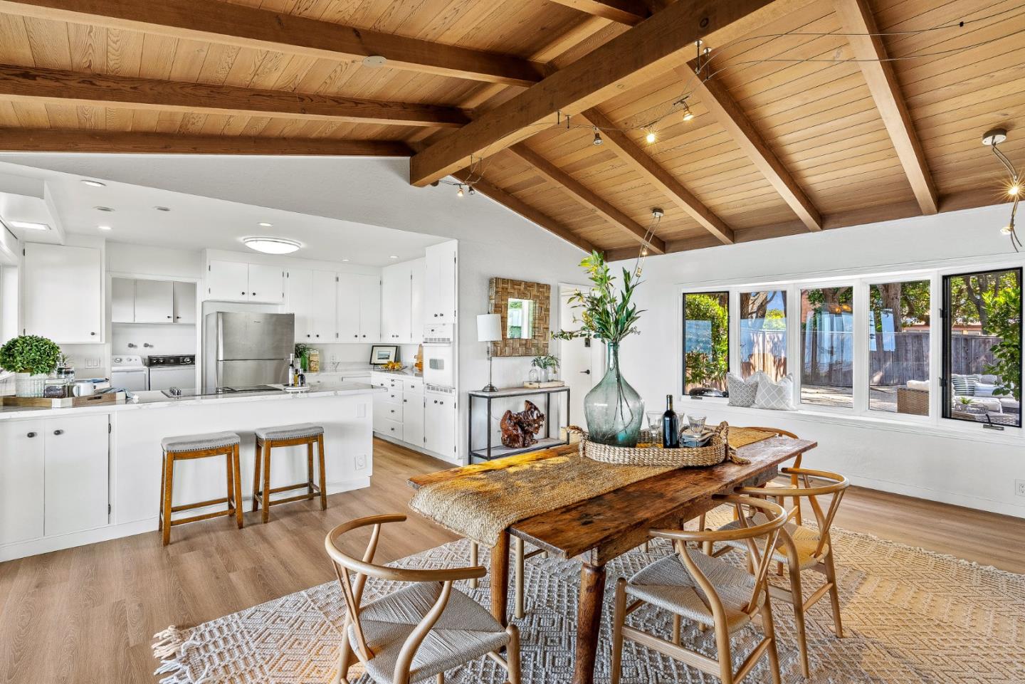701 Seacliff Drive Aptos, CA 95003 - Photo 15 of 76 a dining hall with stainless steel appliances granite countertop furniture and fireplace