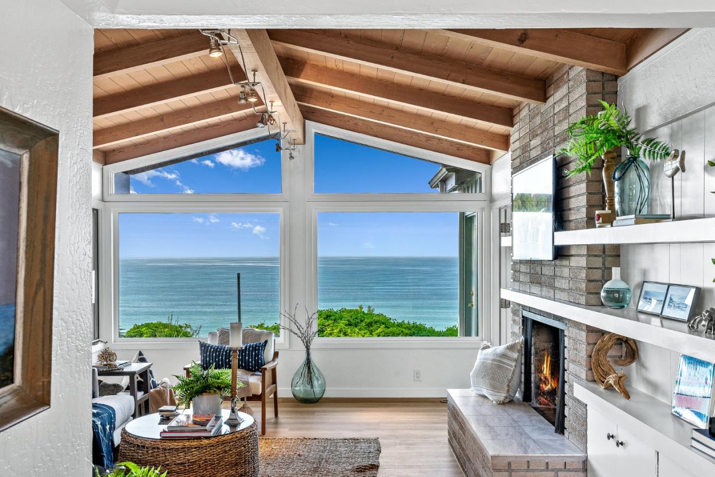 701 Seacliff Drive Aptos, CA 95003 - Photo 3 of 76 a living room with furniture and a potted plant