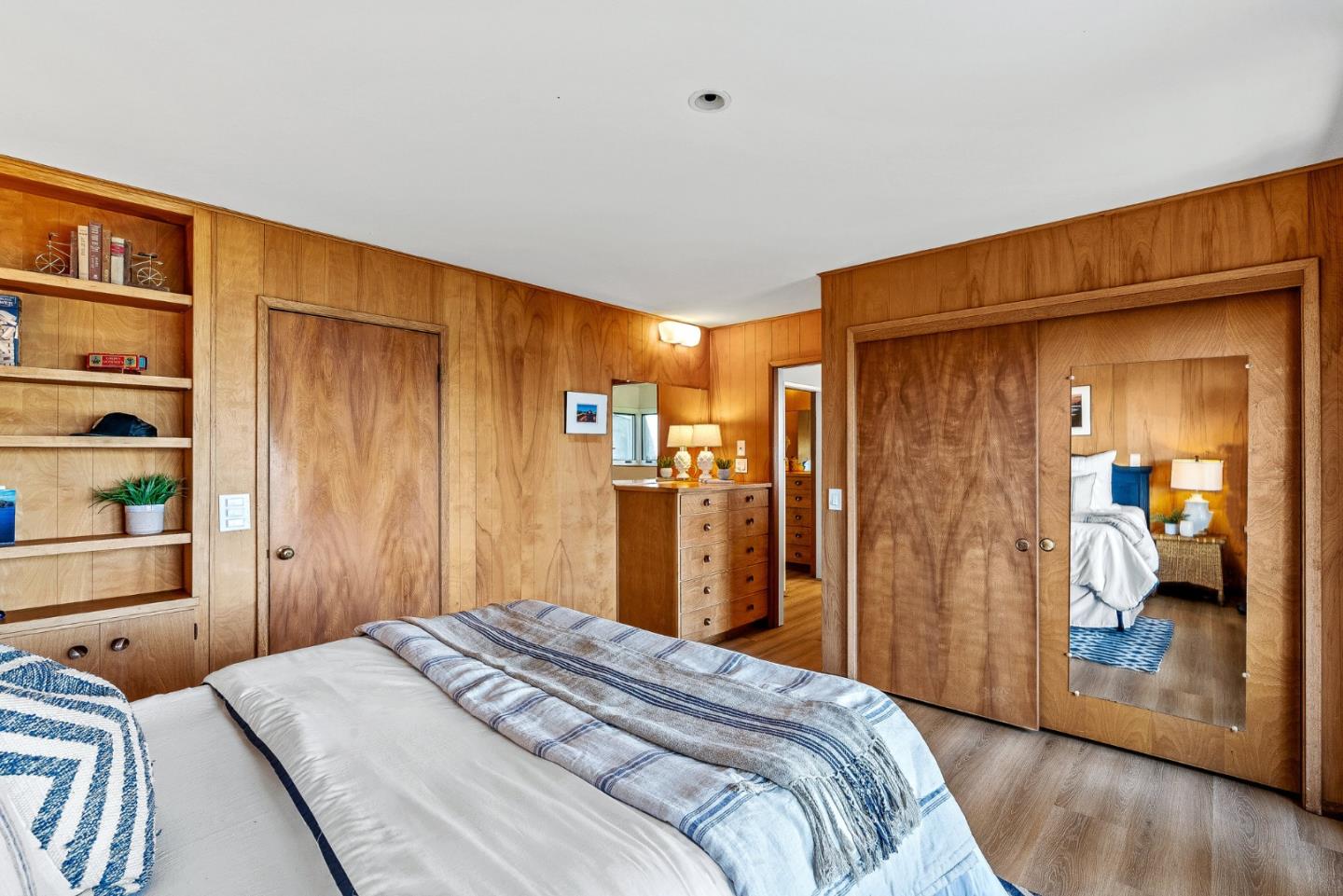 701 Seacliff Drive Aptos, CA 95003 - Photo 33 of 76 a bedroom with a bed and a closet