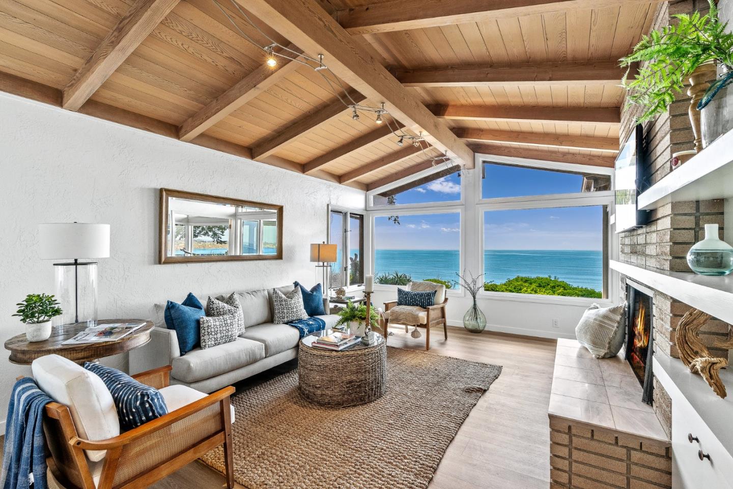 701 Seacliff Drive Aptos, CA 95003 - Photo 4 of 76 a living room with furniture and a potted plant