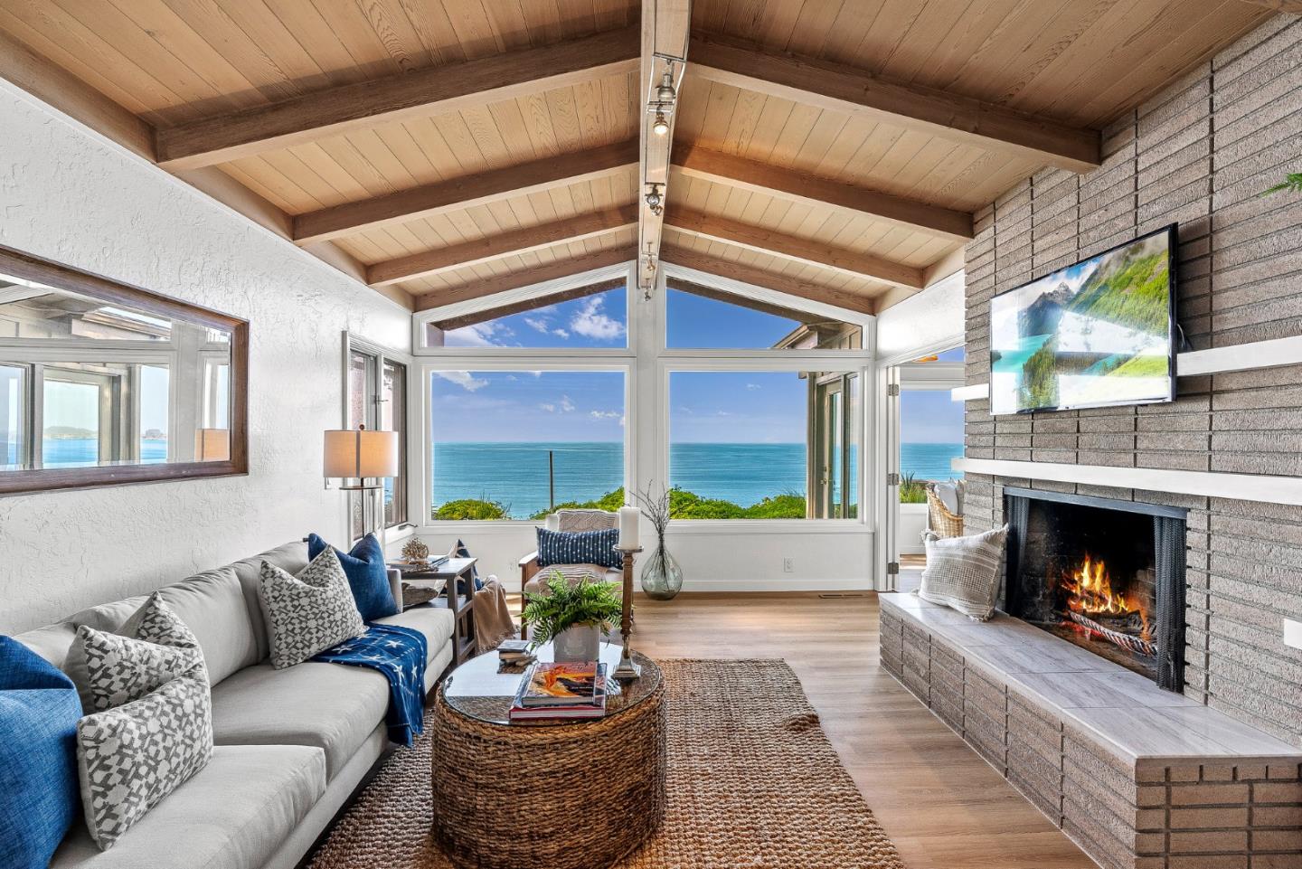701 Seacliff Drive Aptos, CA 95003 - Photo 5 of 76 a living room with furniture and a fireplace