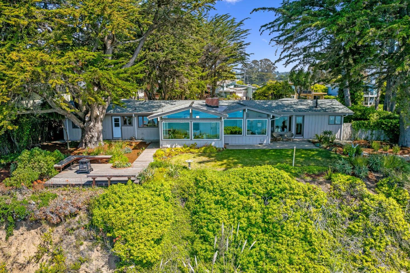 701 Seacliff Drive Aptos, CA 95003 - Photo 61 of 76 a view of a house with swimming pool and porch with furniture