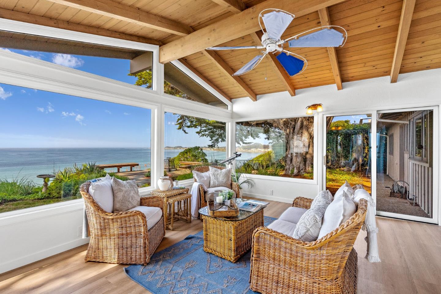 701 Seacliff Drive Aptos, CA 95003 - Photo 9 of 76 a living room with patio furniture and potted plants