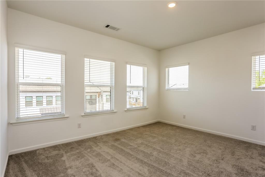 339 Sammon Way Lawrenceville, GA 30046 - Photo 11 of 20 an empty room with a window