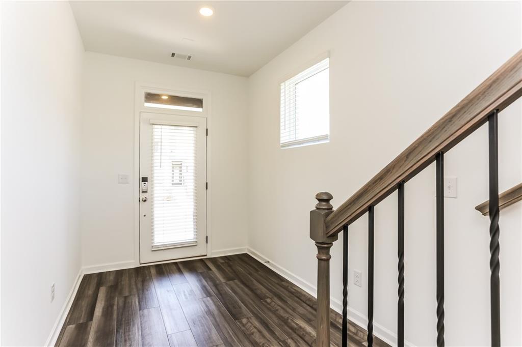 339 Sammon Way Lawrenceville, GA 30046 - Photo 3 of 20 a view of an entryway with wooden floor