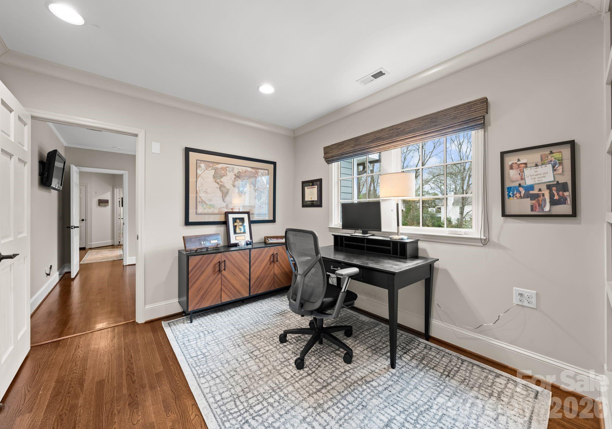 3800 River Ridge Road Charlotte, NC 28226 - Photo 32 of 48 a view of a workspace with furniture and a window
