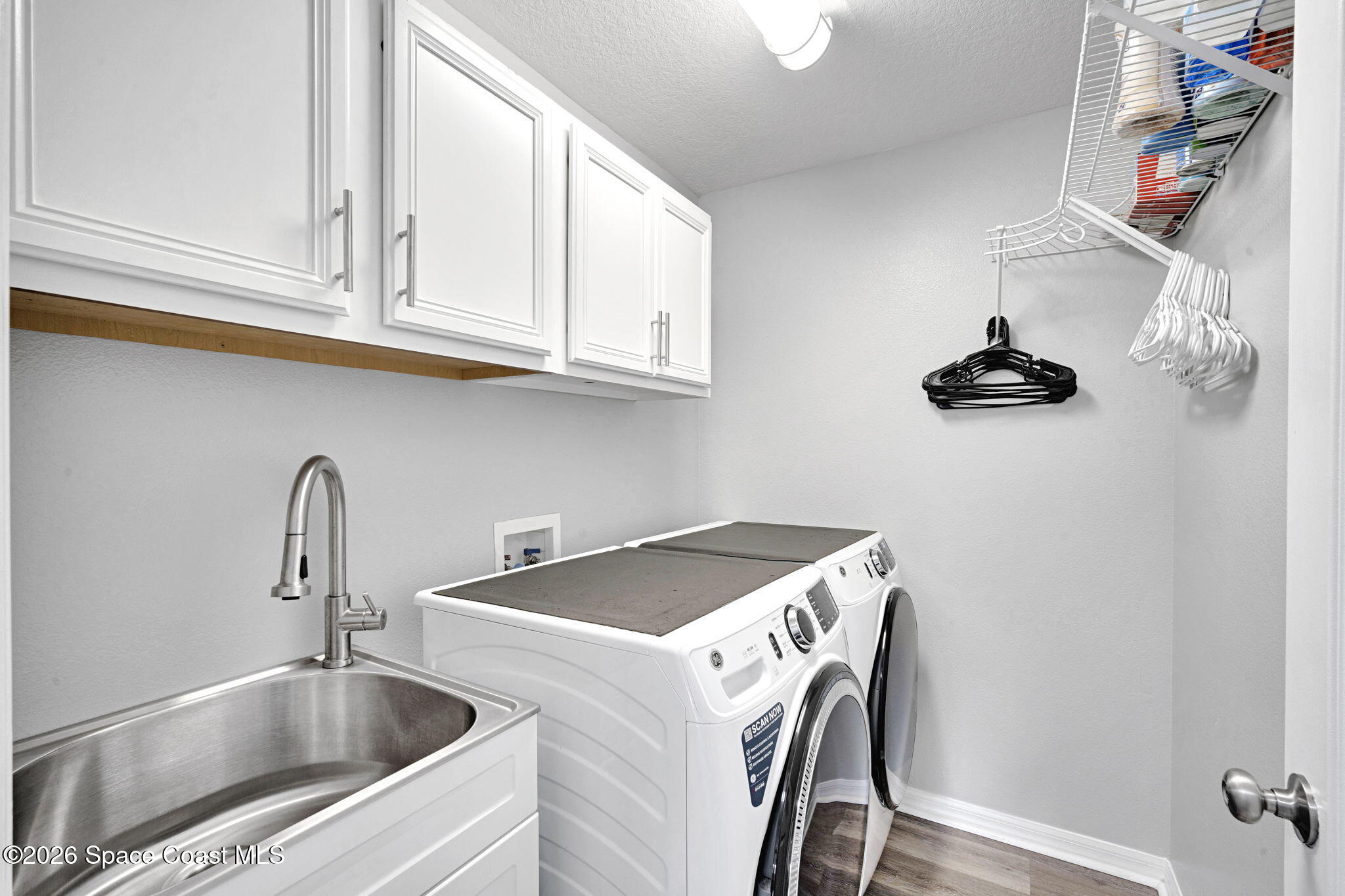 4126 Fitzroy Reef Drive Mims, FL 32754 - Photo 42 of 62 Laundry Room