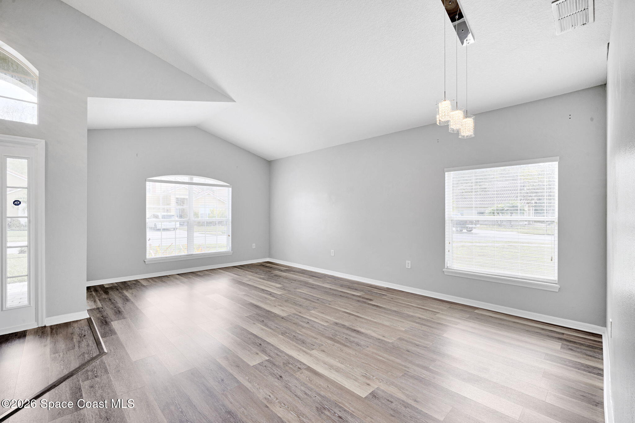 4126 Fitzroy Reef Drive Mims, FL 32754 - Photo 9 of 62 Living Room/ Dining area