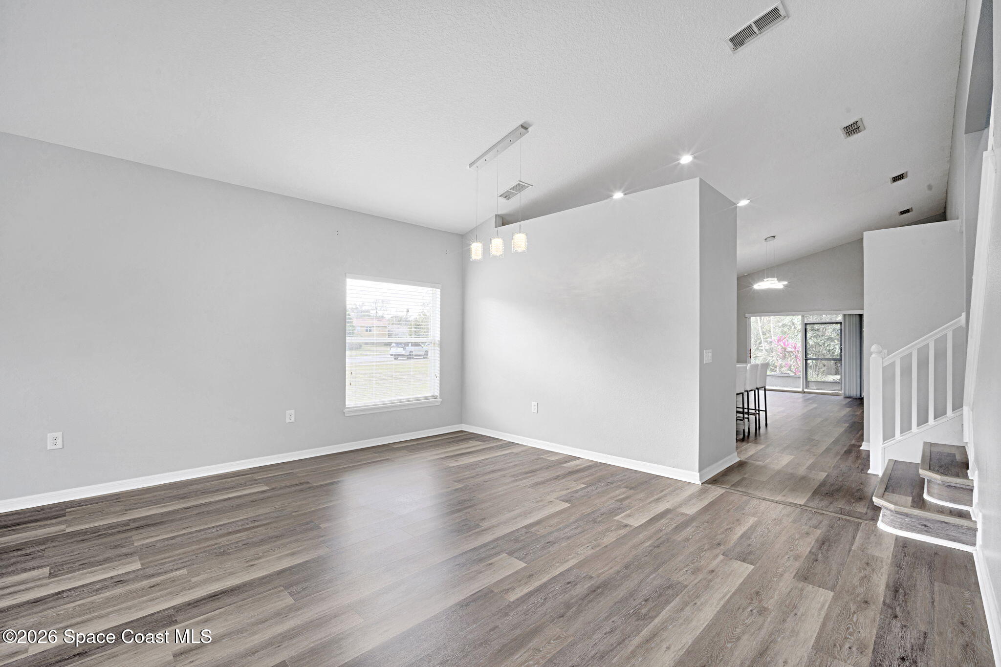 4126 Fitzroy Reef Drive Mims, FL 32754 - Photo 10 of 62 Living Room/ Dining area