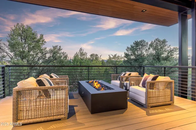 a view of backyard with large windows