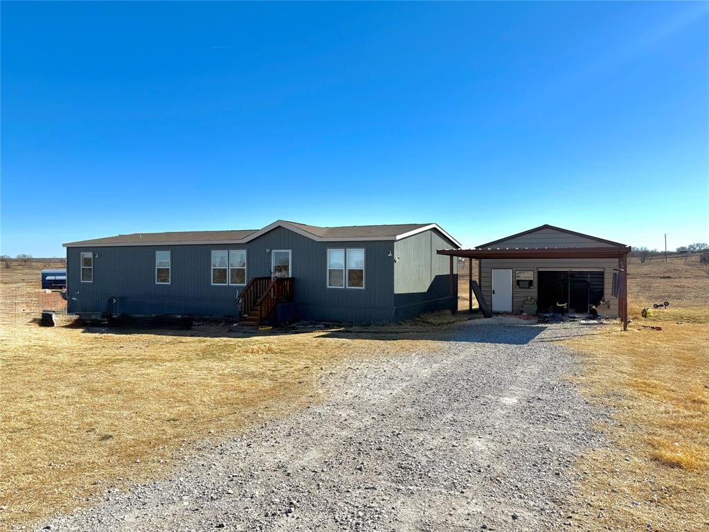 126 Common Way Boyd, TX 76023 - Photo 2 of 14 a house view with a outdoor space