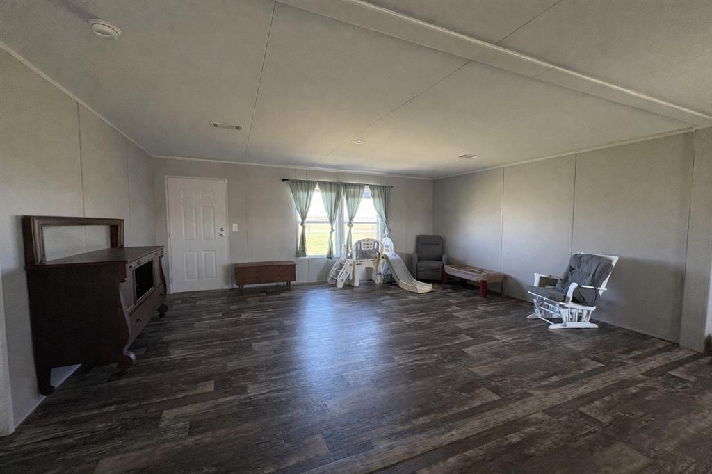 126 Common Way Boyd, TX 76023 - Photo 4 of 14 a living room with furniture and a wooden floor