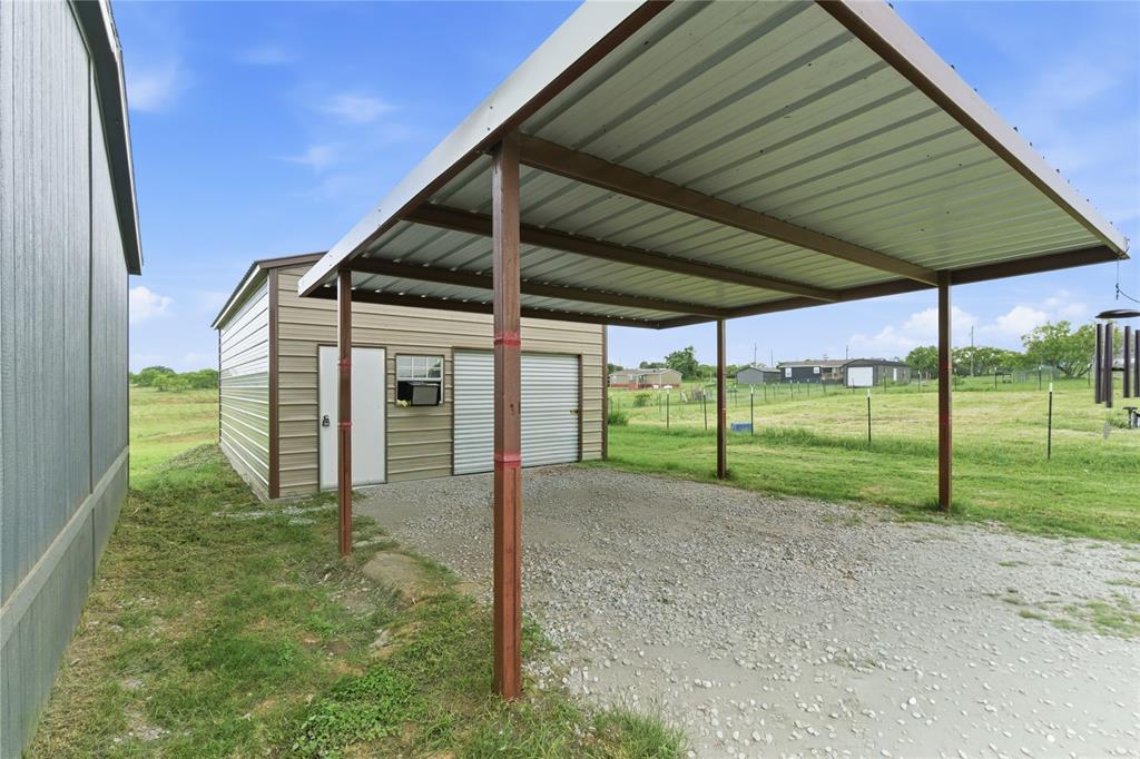 126 Common Way Boyd, TX 76023 - Photo 5 of 19 a view of a house with backyard