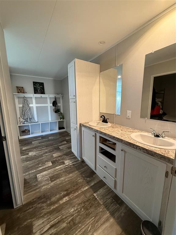 126 Common Way Boyd, TX 76023 - Photo 9 of 14 a bathroom with a sink and a mirror