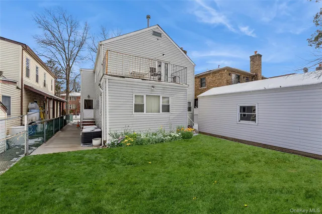 a picture of a bench in front of a wall