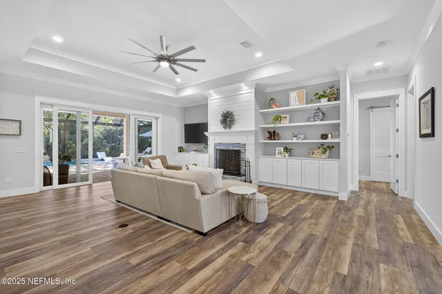 a large kitchen with a table and chairs