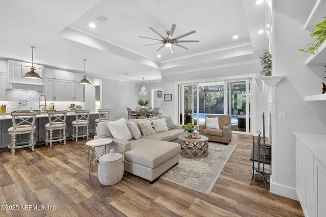 a kitchen with sink stove and cabinets