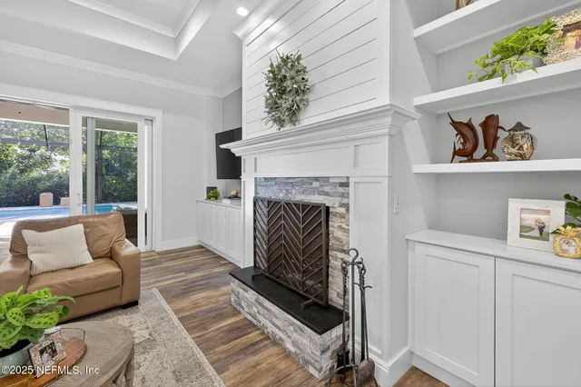 a kitchen with granite countertop cabinets and white appliances