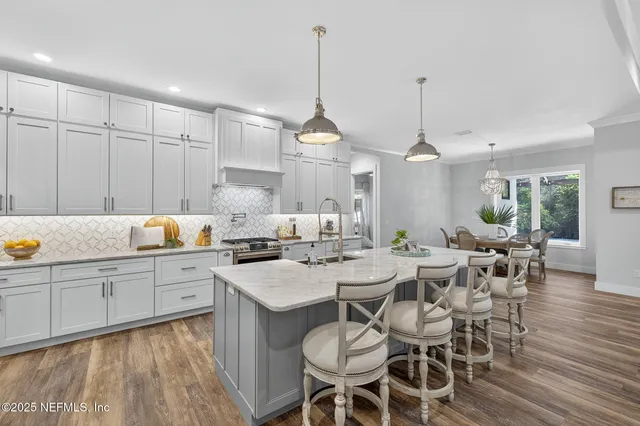 a living room with furniture and windows