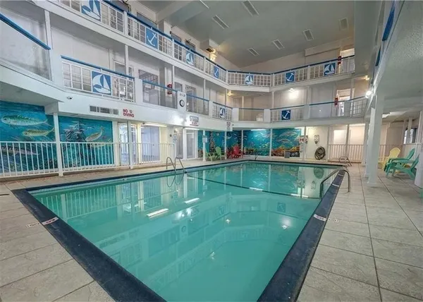 a view of a swimming pool with a fountain