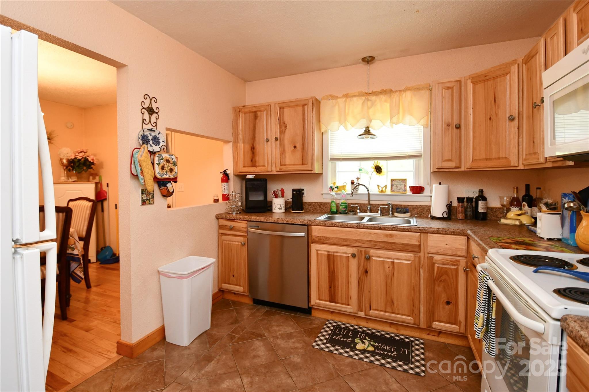 1227 Georges Fork Road Burnsville, NC 28714 - Photo 12 of 36 a kitchen with a sink and appliances