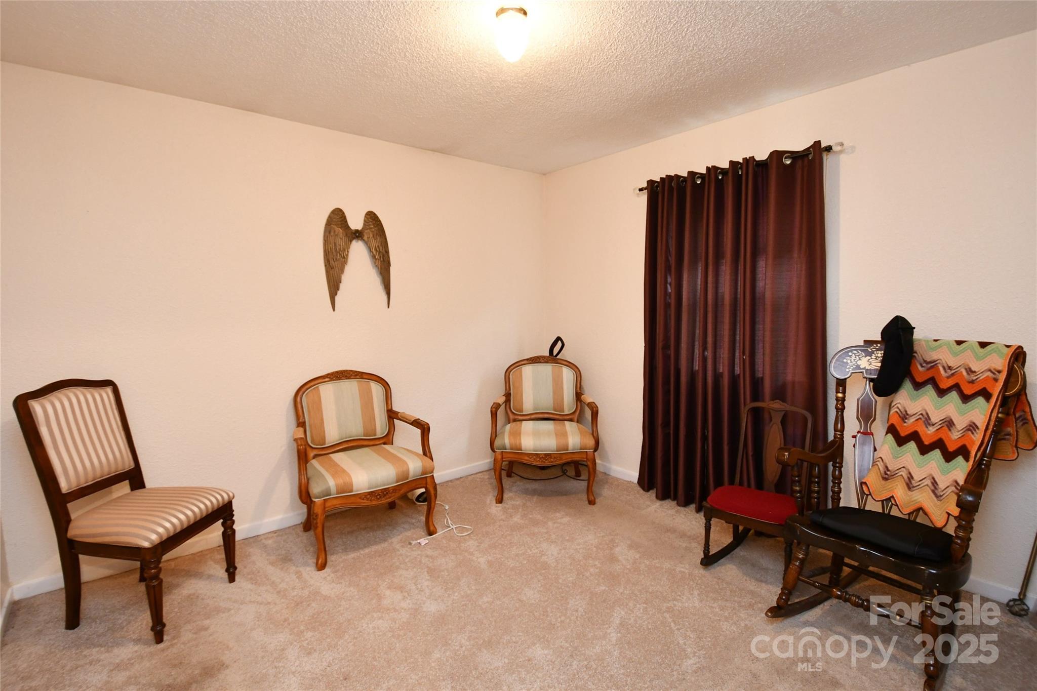 1227 Georges Fork Road Burnsville, NC 28714 - Photo 13 of 36 a living room with furniture