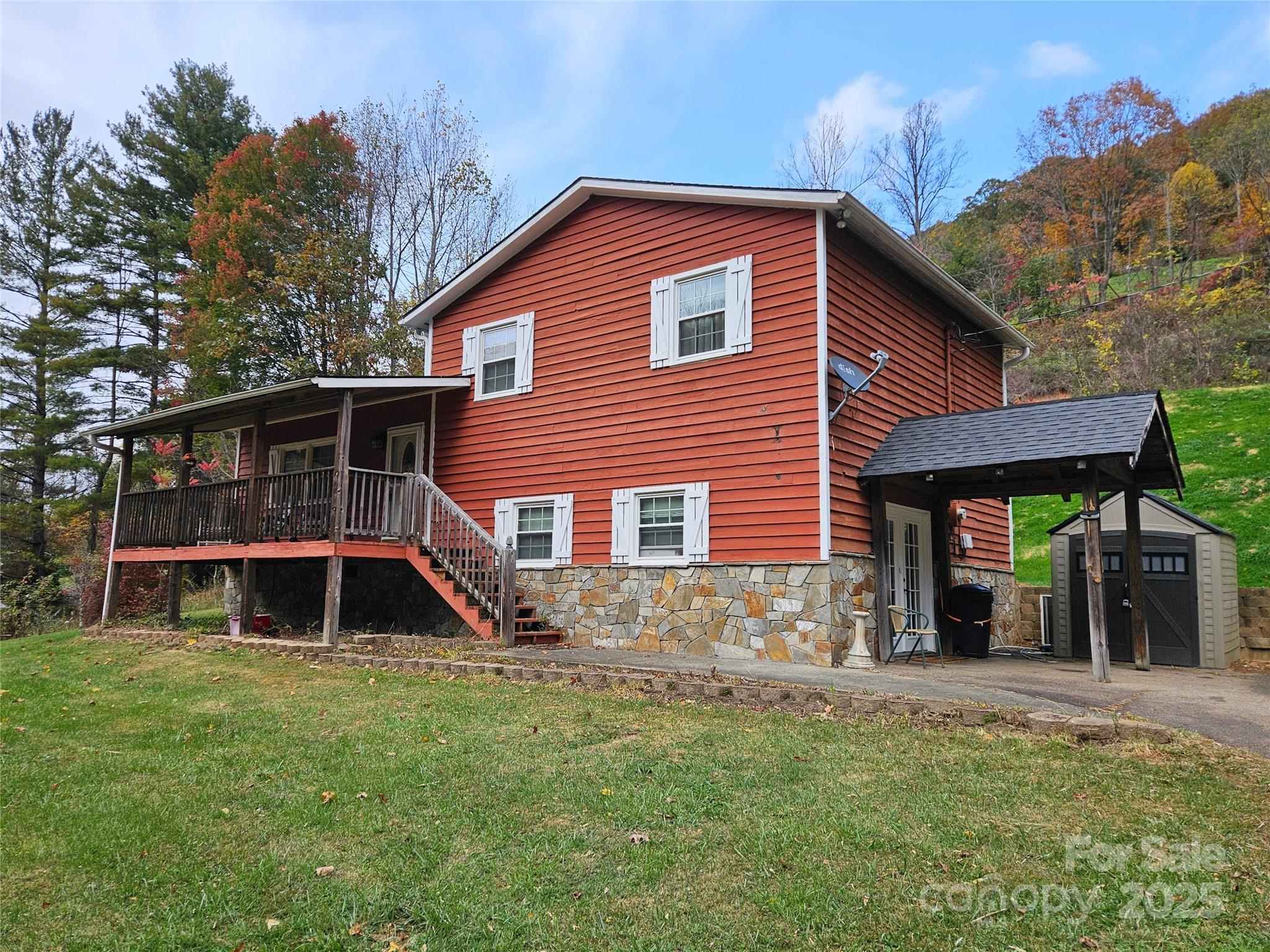 1227 Georges Fork Road Burnsville, NC 28714 - Photo 28 of 36 a front view of a house with a yard