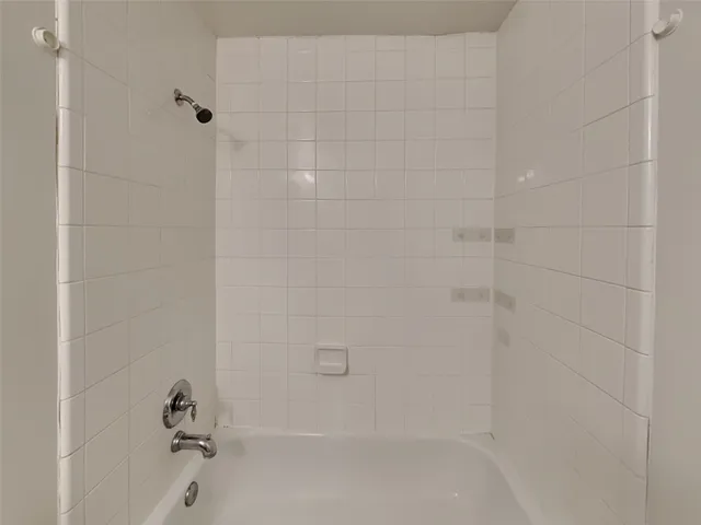 a bathroom with a bathtub