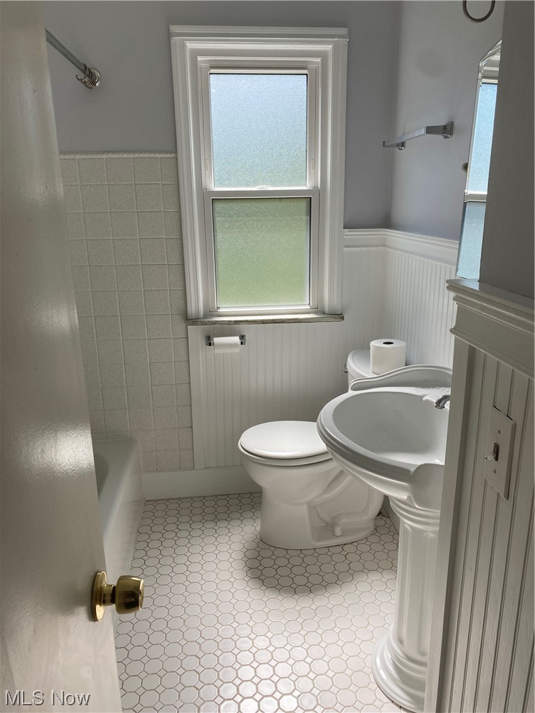 5680 Shawnee Road Cleveland, OH 44124 - Photo 10 of 21 Bathroom featuring washbasin and light tile flooring