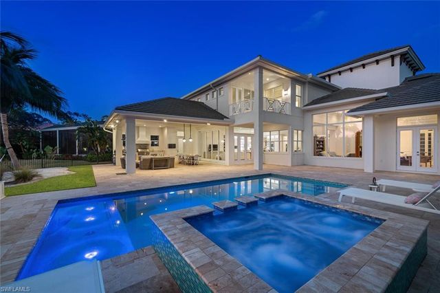a view of a house with a swimming pool