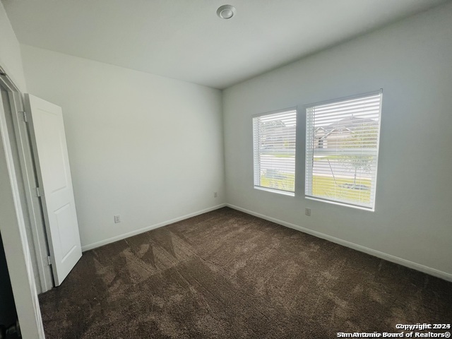 32141 Morels Avenue Bulverde, TX 78163 - Photo 12 of 22 a view of an empty room with a window