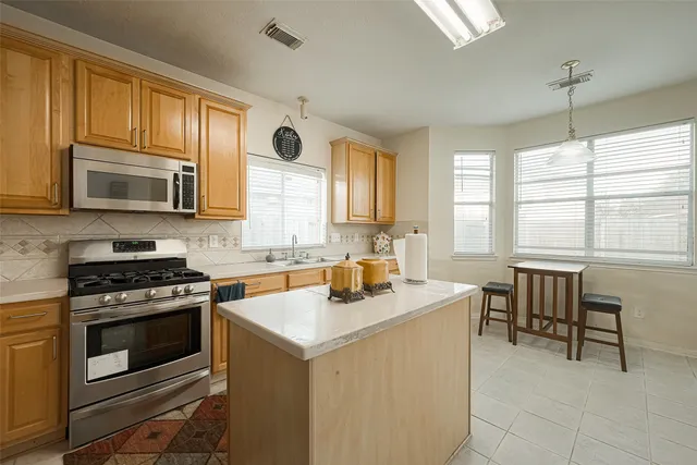 a room with furniture and a window