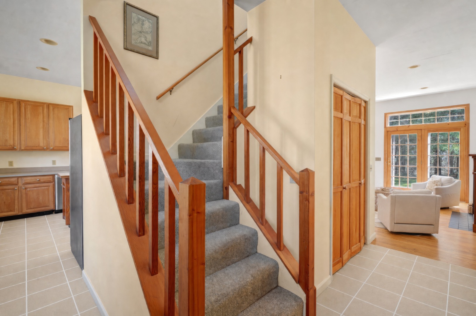 2 Cosmos Way Edgartown, MA 02539 - Photo 19 of 29 a view of a hallway with wooden floor and staircase