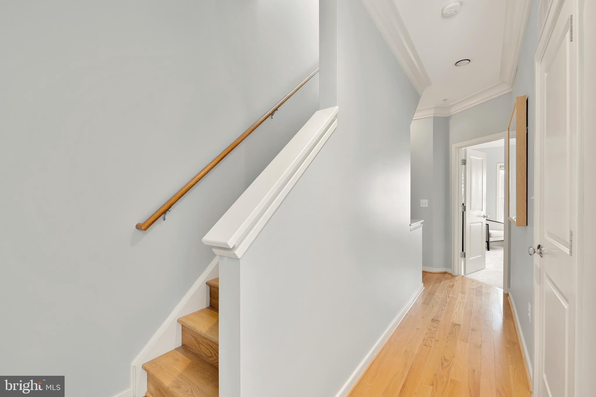 908 3rd Place Southeast Washington, DC 20003 - Photo 18 of 26 a view of a hallway with wooden floor and entryway