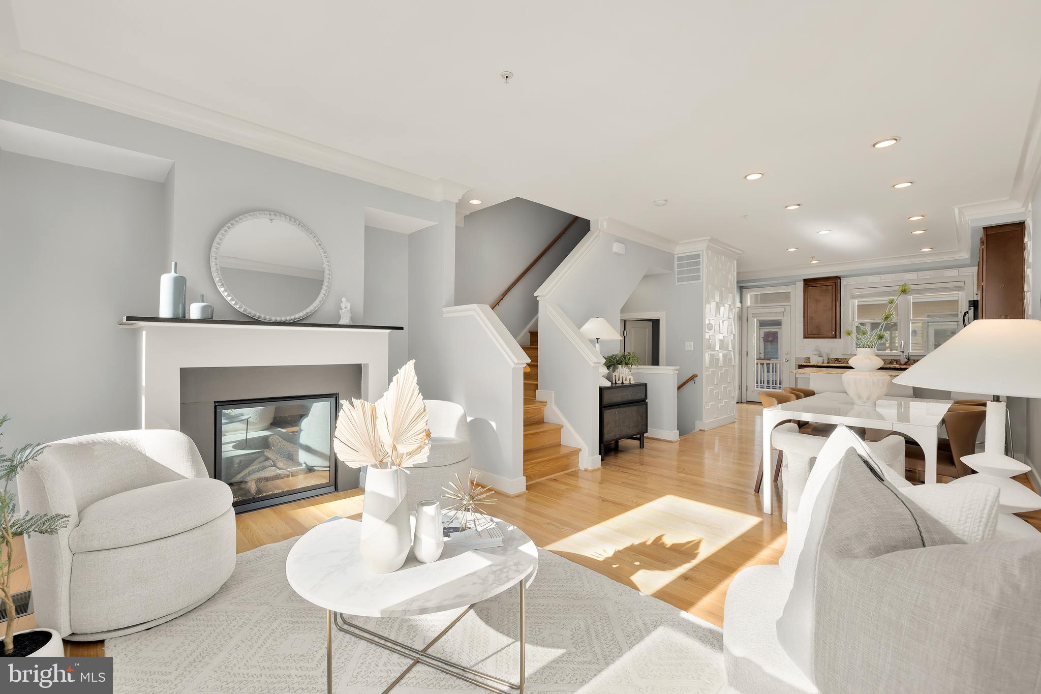 908 3rd Place Southeast Washington, DC 20003 - Photo 3 of 26 a living room with furniture and a fireplace