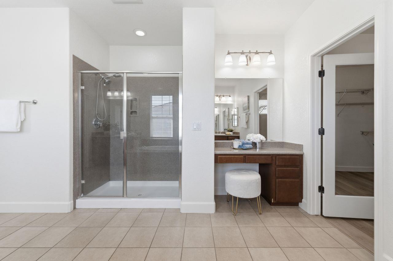 698 West Rico Way Tracy, CA 95391 - Photo 30 of 48 a bathroom with a sink a toilet and shower
