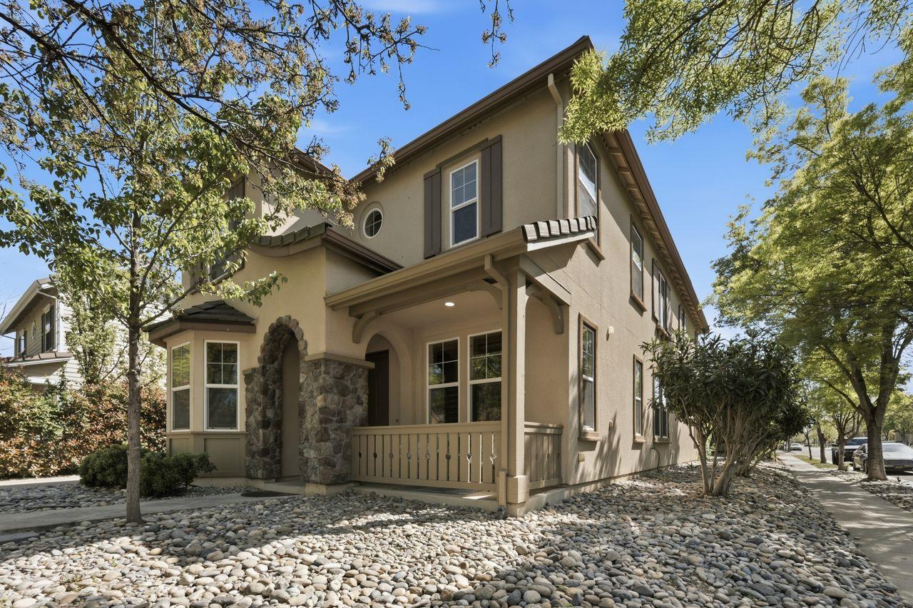 698 West Rico Way Tracy, CA 95391 - Photo 4 of 48 a front view of a house with a tree